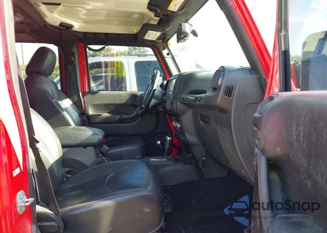 2015 Jeep Wrangler Unlimited Sahara z USA, uszkodzony, nr VIN 1C4BJWEG5FL701087